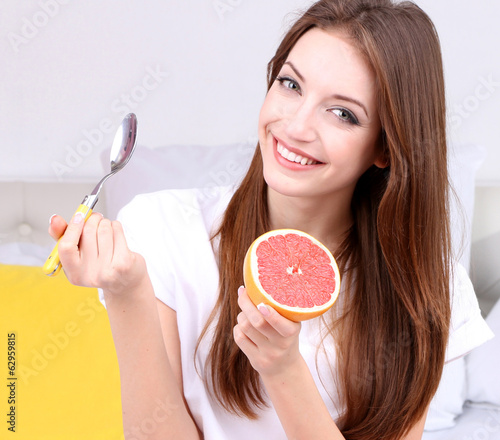 Young beautiful woman on be...