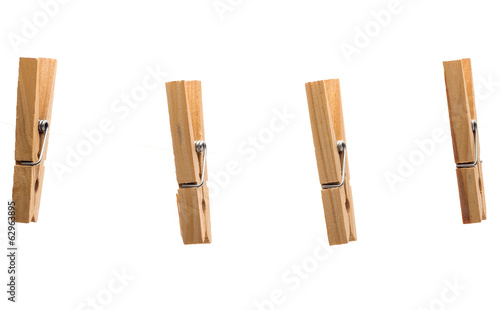 Clothespins on white background photo