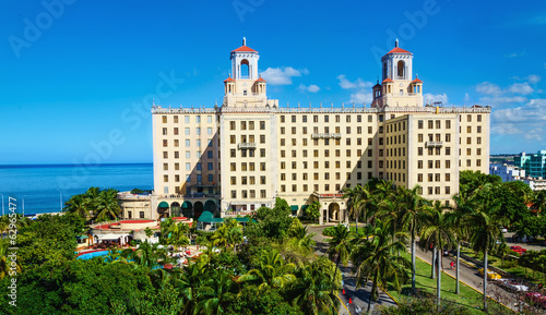 View of Hotel Nacional among green palm trees in Havana. Cuba © A.Jedynak