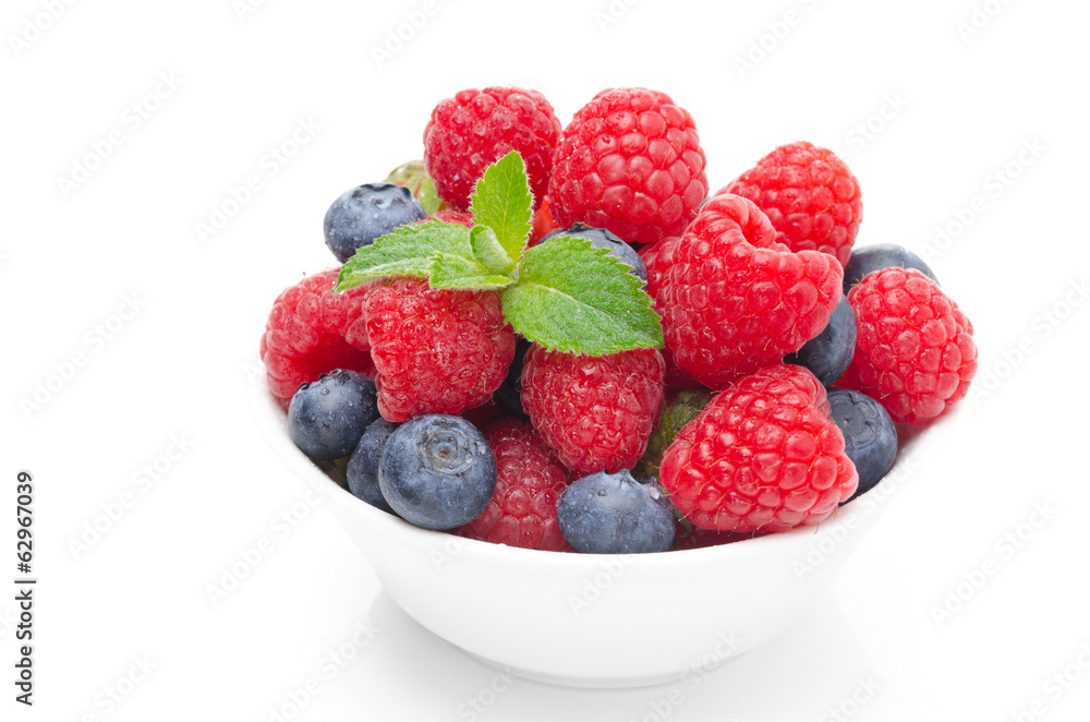 fresh berries (raspberries, blueberries, strawberries) in a bowl fresh berries (raspberries, blueberries, strawberries) in a bowl