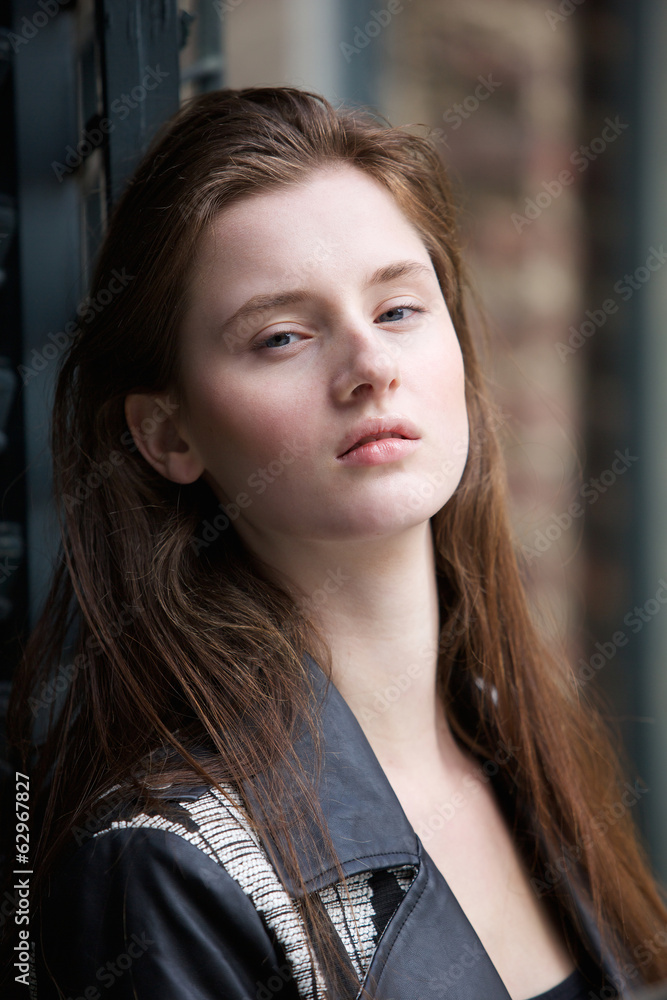 Beautiful woman standing outdoors Beautiful woman standing outdoors