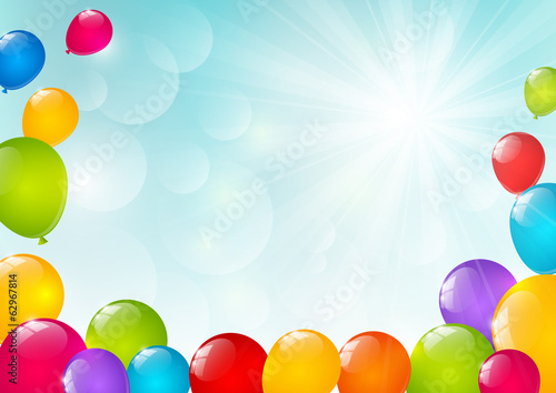 Color balloons on sunny background