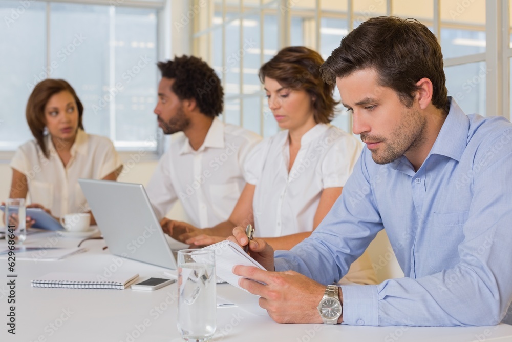 Business people in a meeting at office Business people in a meeting at office