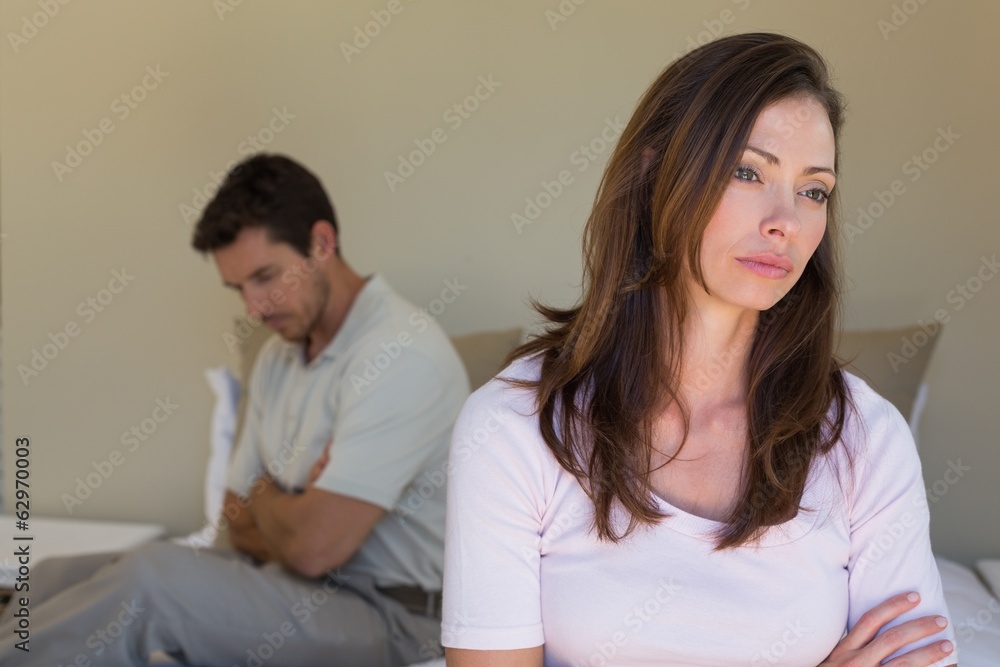 Couple not talking after an argument in bed Couple not talking after an argument in bed