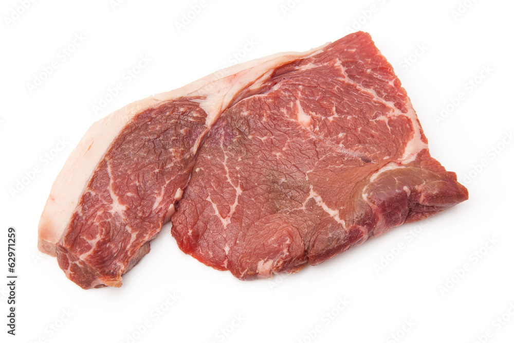 Aged rump steak isolated on a white studio background. Aged rump steak isolated on a white studio background.