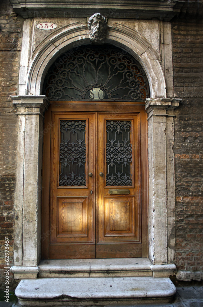 Old wooden door in Venice