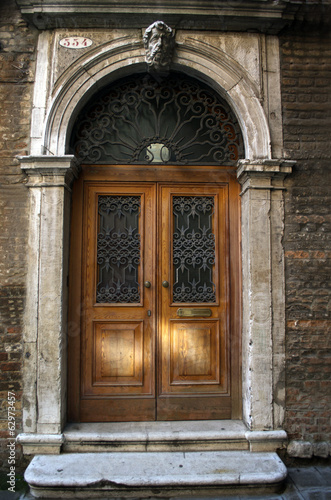 Old wooden door in Venice