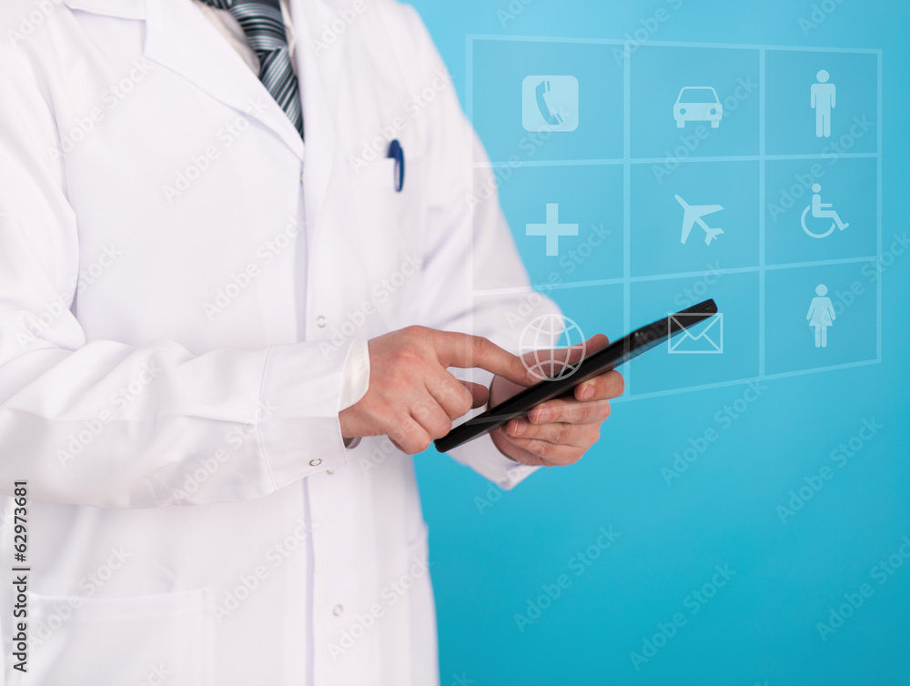 Male scientist pointing on tablet PC over digital interface Male scientist pointing on tablet PC over digital interface