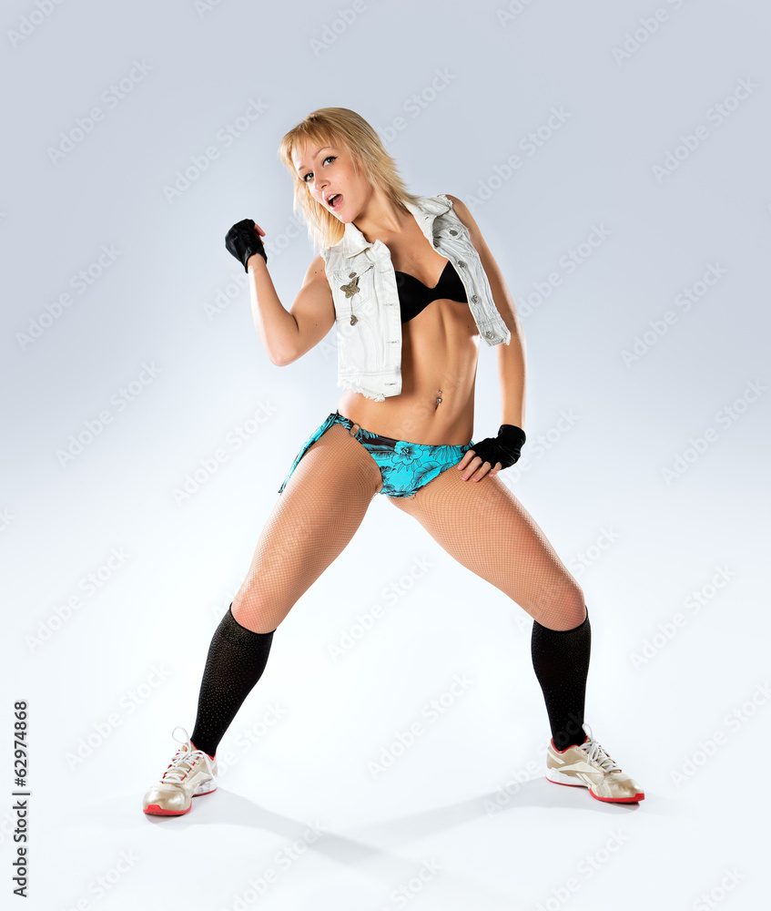 modern style dancer posing on studio background modern style dancer posing on studio background