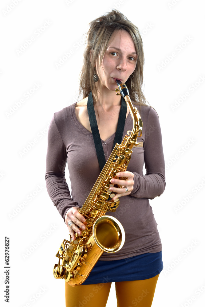 Fototapeta premium young woman playing the saxophone