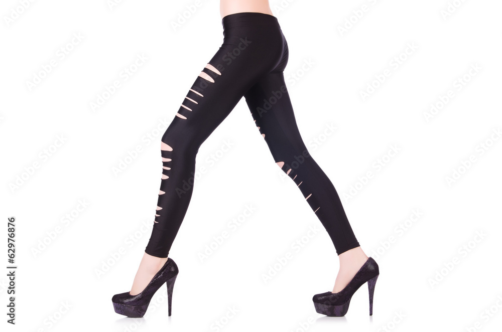 Woman legs with stockings on white