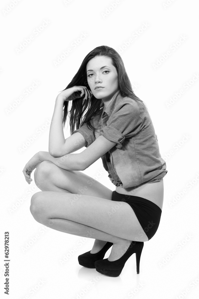 Woman in lingerie wearing an open casual shirt Woman in lingerie wearing an open casual shirt
