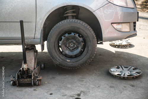 Replacement tires on the car at the service station
