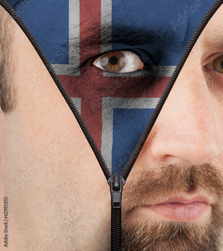 Unzipping face to flag of Iceland photo