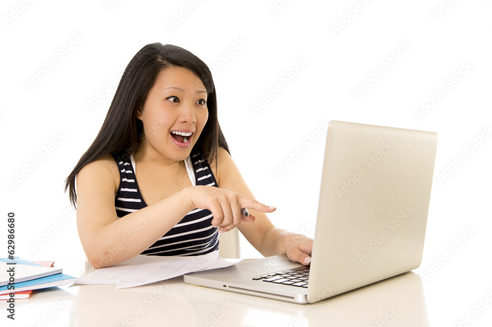 happy chinese asian woman working pointing at computer happy chinese asian woman working pointing at computer