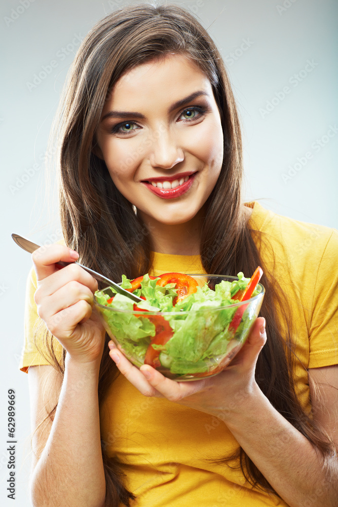 Woman diet concept portrait. Female model hold green salad. Woman diet concept portrait. Female model hold green salad.