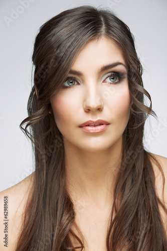 Beauty style face portrait of young woman looking side.