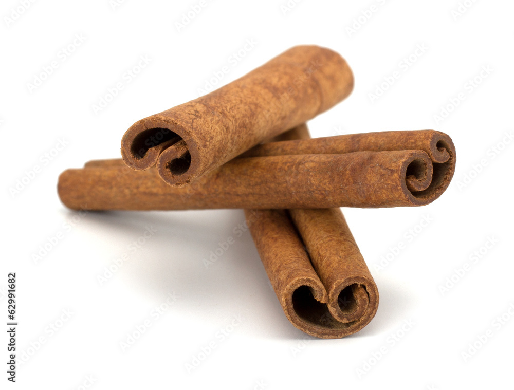 cinnamon sticks stacked on white background cinnamon sticks stacked on white background