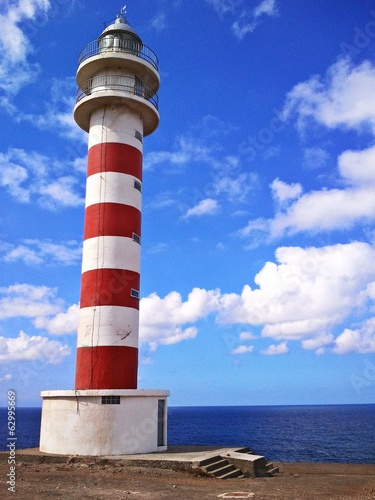 lonely lighthouse on a seacoast