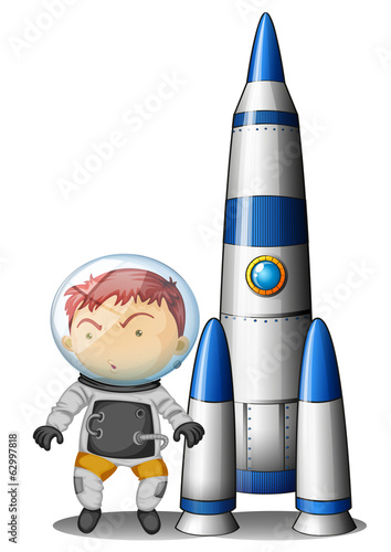 A boy beside the rocket