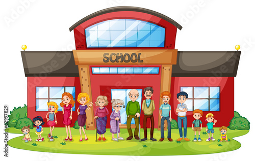 A big family in front of the school building