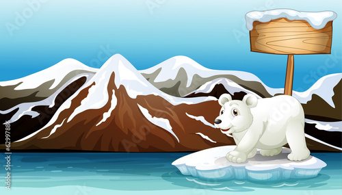 An iceberg in the ocean with an empty signboard and a Polar bear