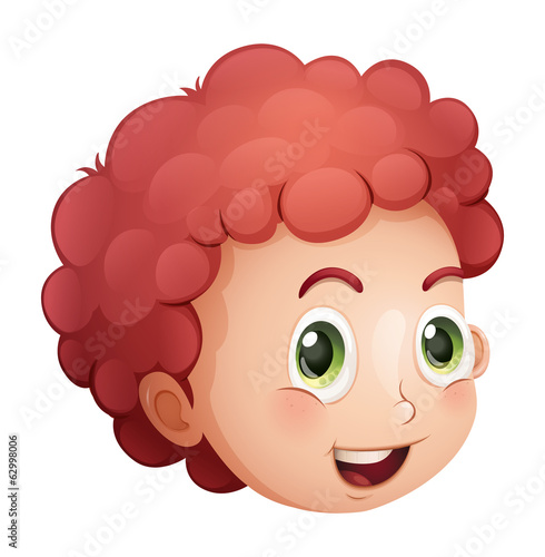 A face of a curly haired young man