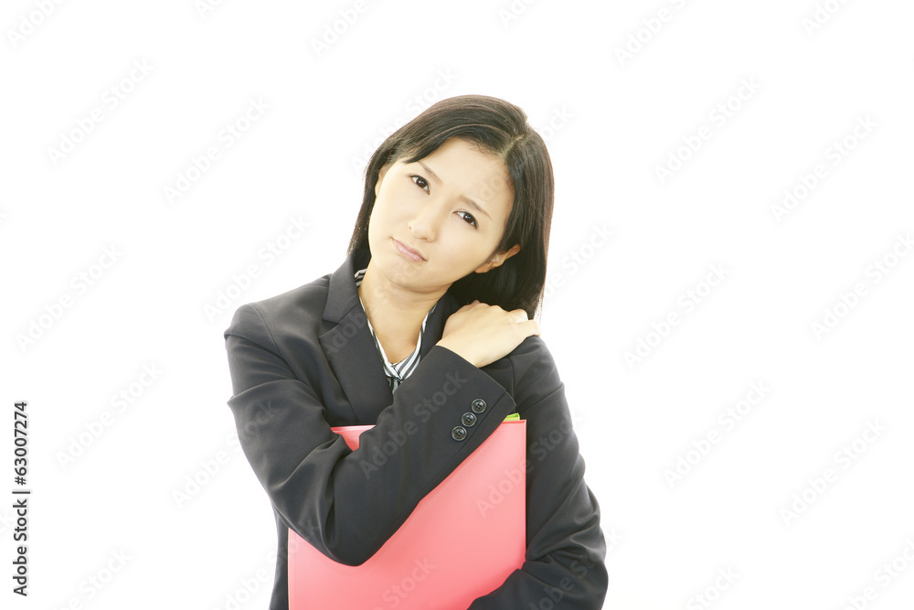 肩痛を訴える女性 肩痛を訴える女性