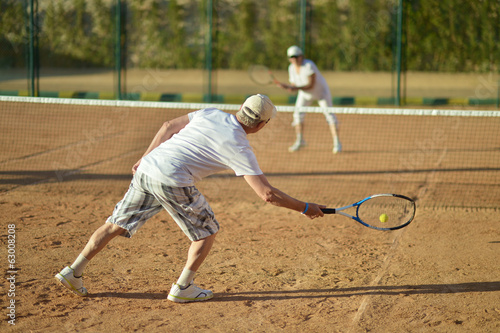 Senior couple playing tennis © aletia2011
