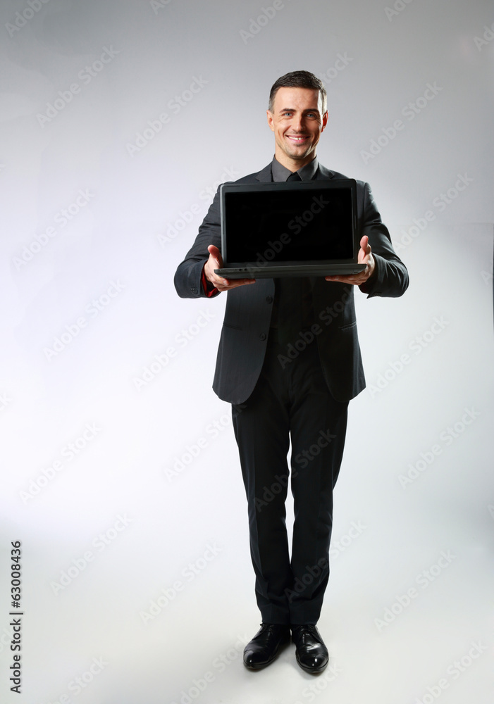 Full-length portrait of a businessman standing 