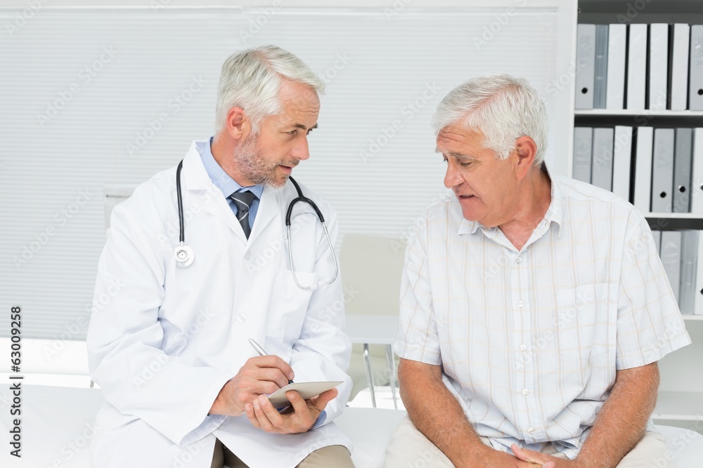 Male senior patient visiting a doctor Male senior patient visiting a doctor