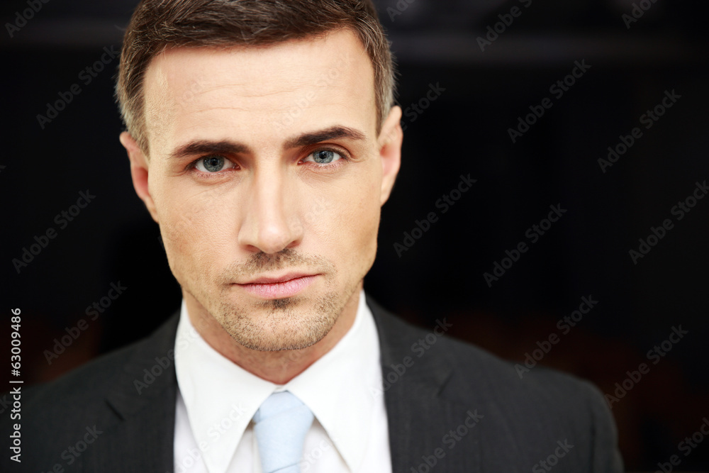 Portrait of a confident businessman at office Portrait of a confident businessman at office