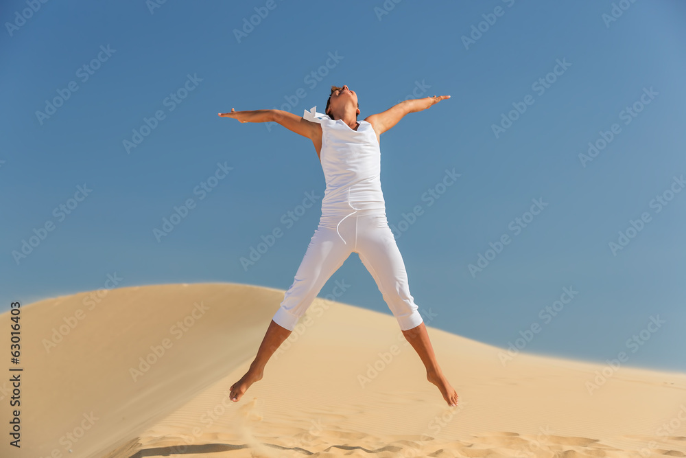 Happy Woman Jumping in the Sea Sunset Happy Woman Jumping in the Sea Sunset