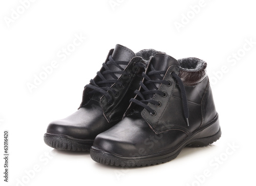 Short black leather boots.