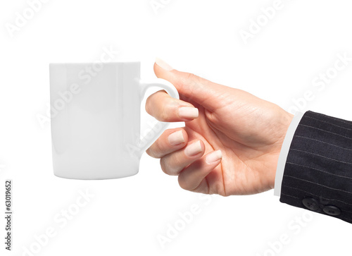 Woman hand with white cup of coffee
