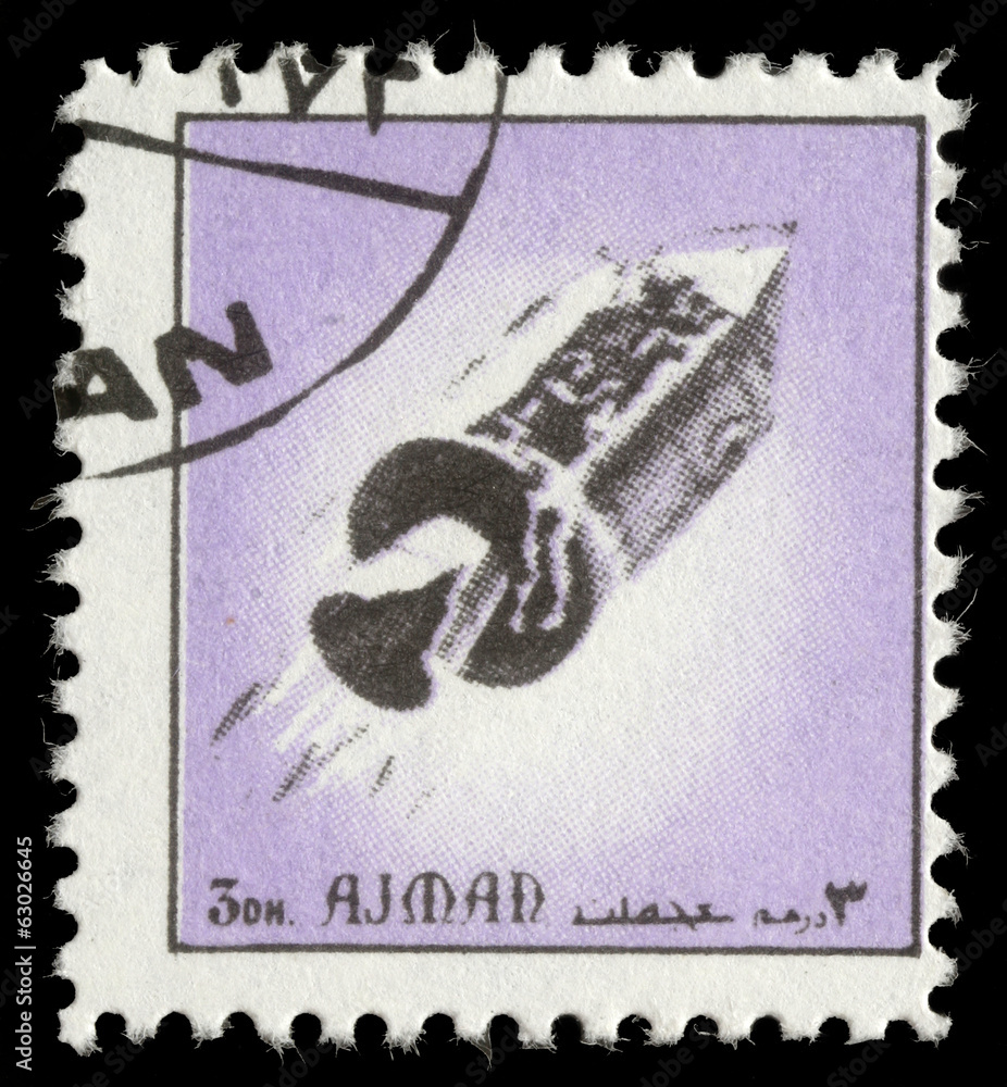 Obraz premium Stamp printed in emirate Ajman show spaceship, circa 1972