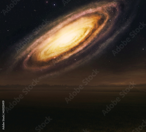 Fototapeta Naklejka Na Ścianę i Meble -  Galaxy over field.