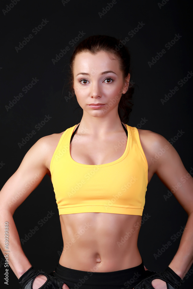 Young attractive female fitness model posing Young attractive female fitness model posing