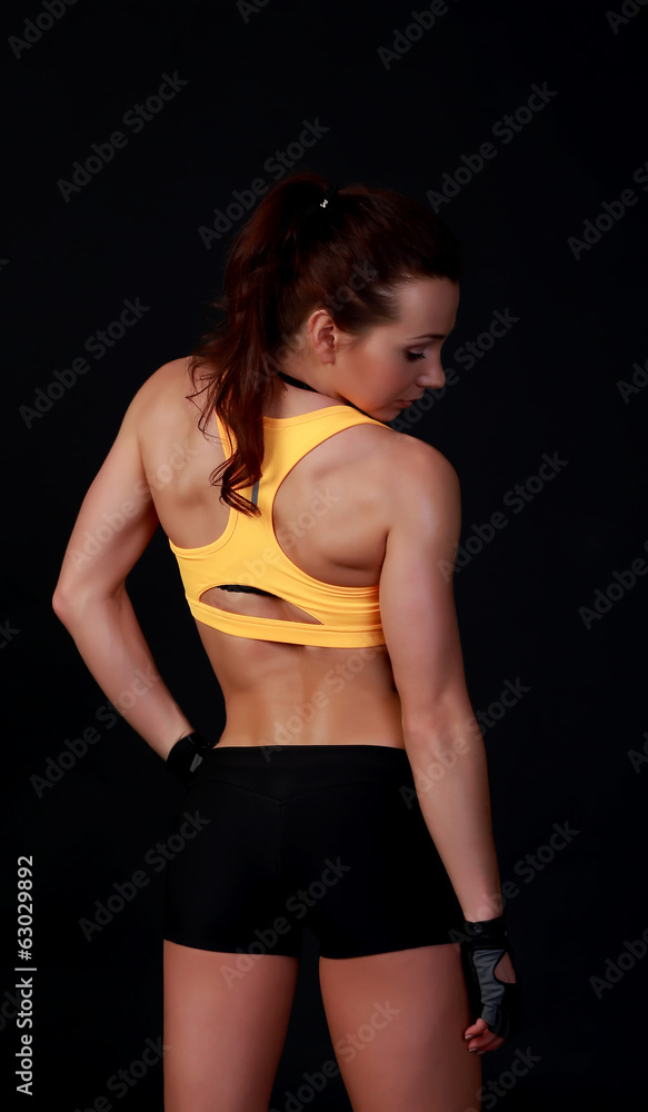 Young attractive female fitness model posing Young attractive female fitness model posing