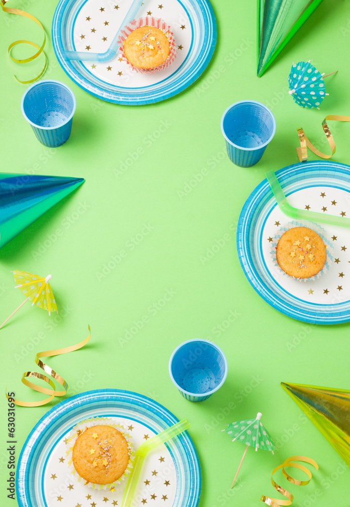 Boy birthday green table setting with party gadgets Boy birthday green table setting with party gadgets