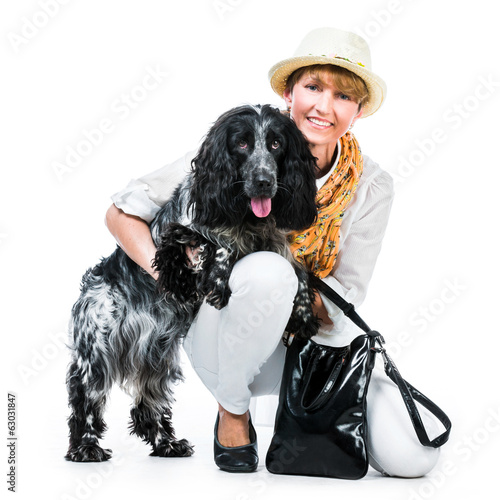 young modern woman with her dog cocker spaniel