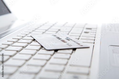 bank card on laptop keyboard