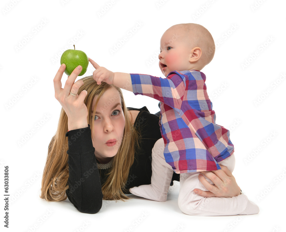 Fototapeta premium mother and child baby boy kid with healthy green apple