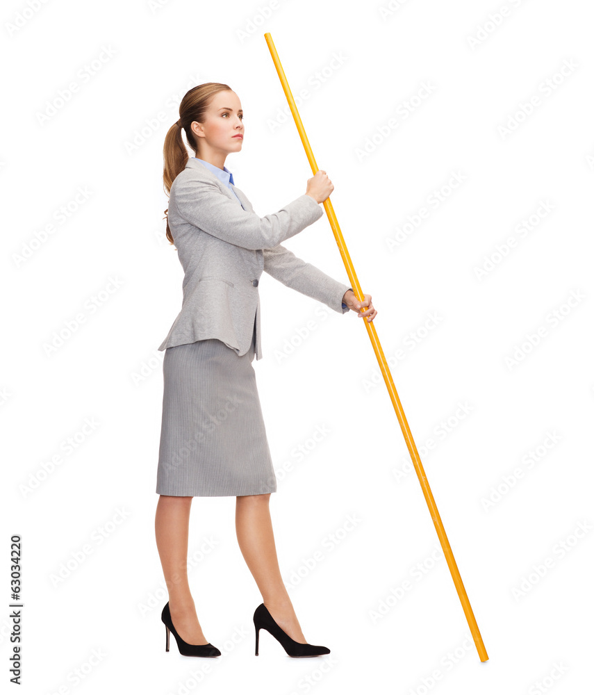 calm woman holding flagpole with imaginary flag calm woman holding flagpole with imaginary flag