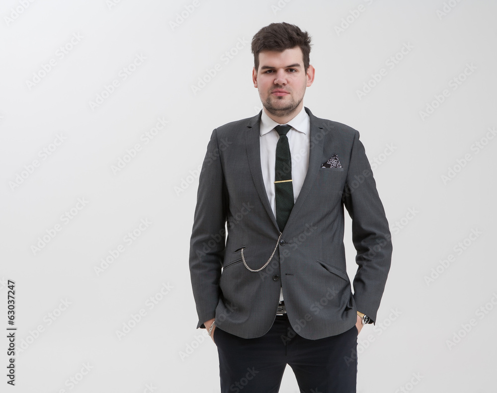 Handsome man makes a gesture with his hand. Handsome man makes a gesture with his hand.