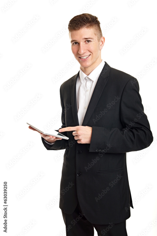 Young businessman at suit working on tablet pc Young businessman at suit working on tablet pc