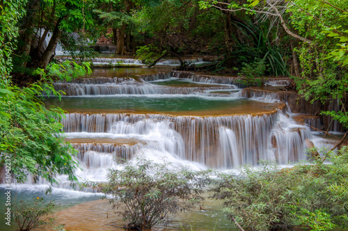 Waterfall in deep rain forest jungle