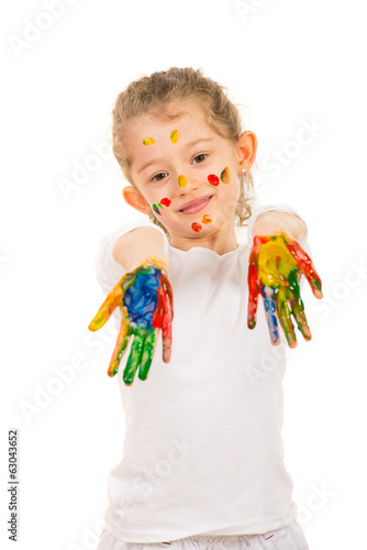 Girl showing messy colorful hands