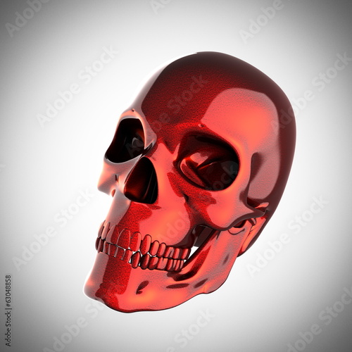 metal skull on gray background photo