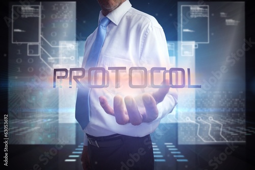 Businessman presenting the word protocol photo
